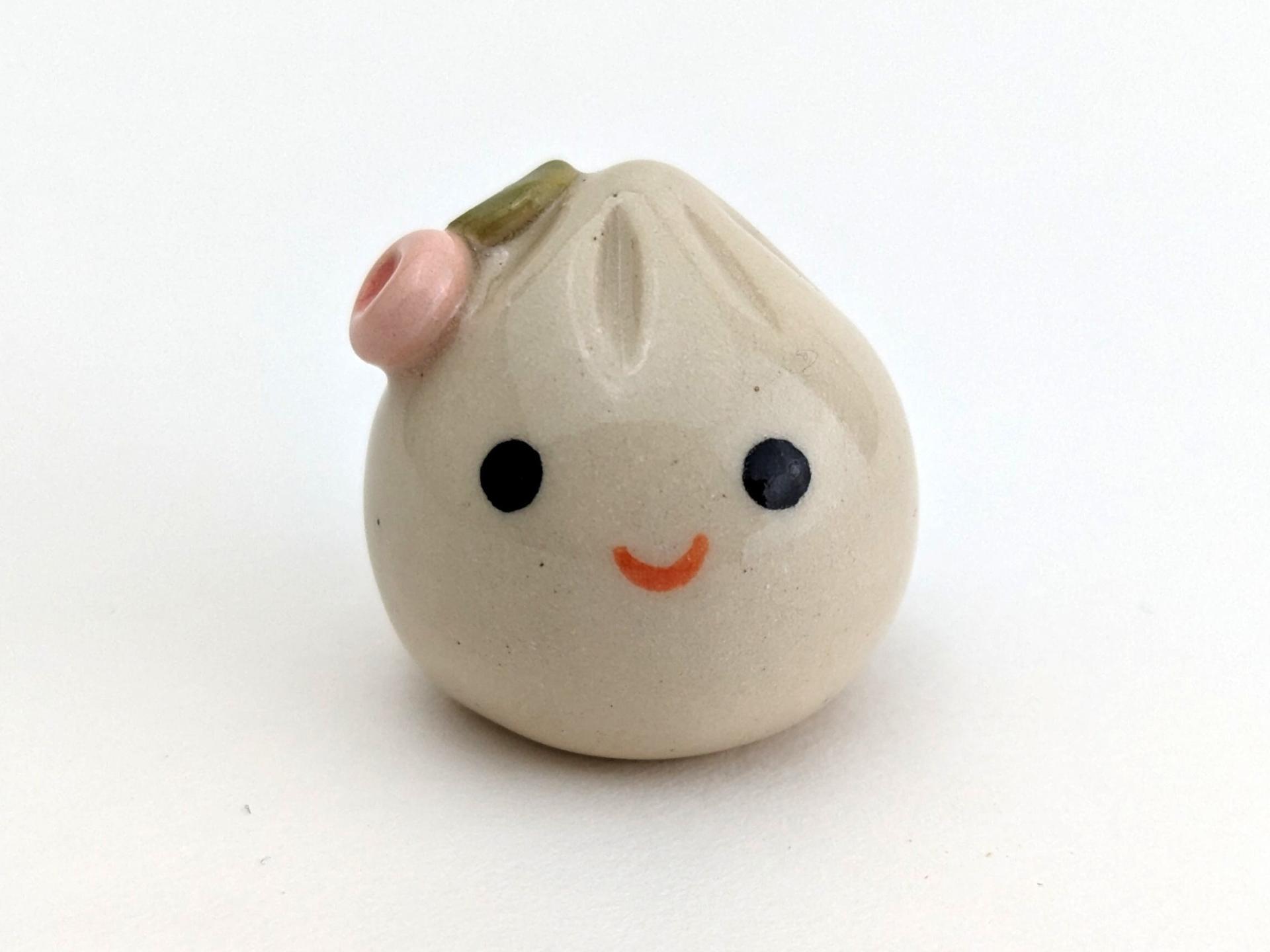 Cute handmade ceramic dumpling with flower. Happy soup dumpling. Adorable gyoza. Xiao long bao. Small-batch ceramics. Hand-painted pottery.